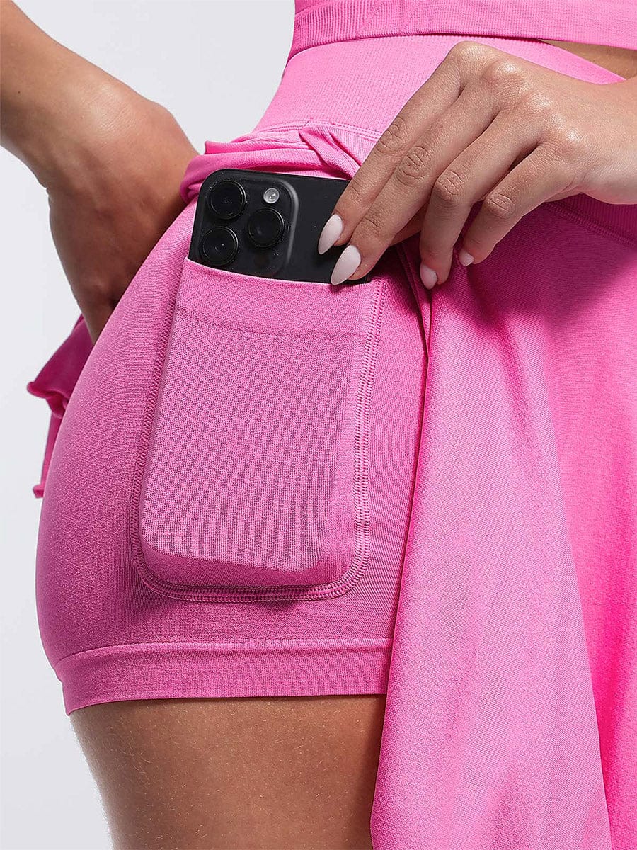 Falda acampanada de cintura media con volantes, pantalones cortos incorporados y bolsillos, venta