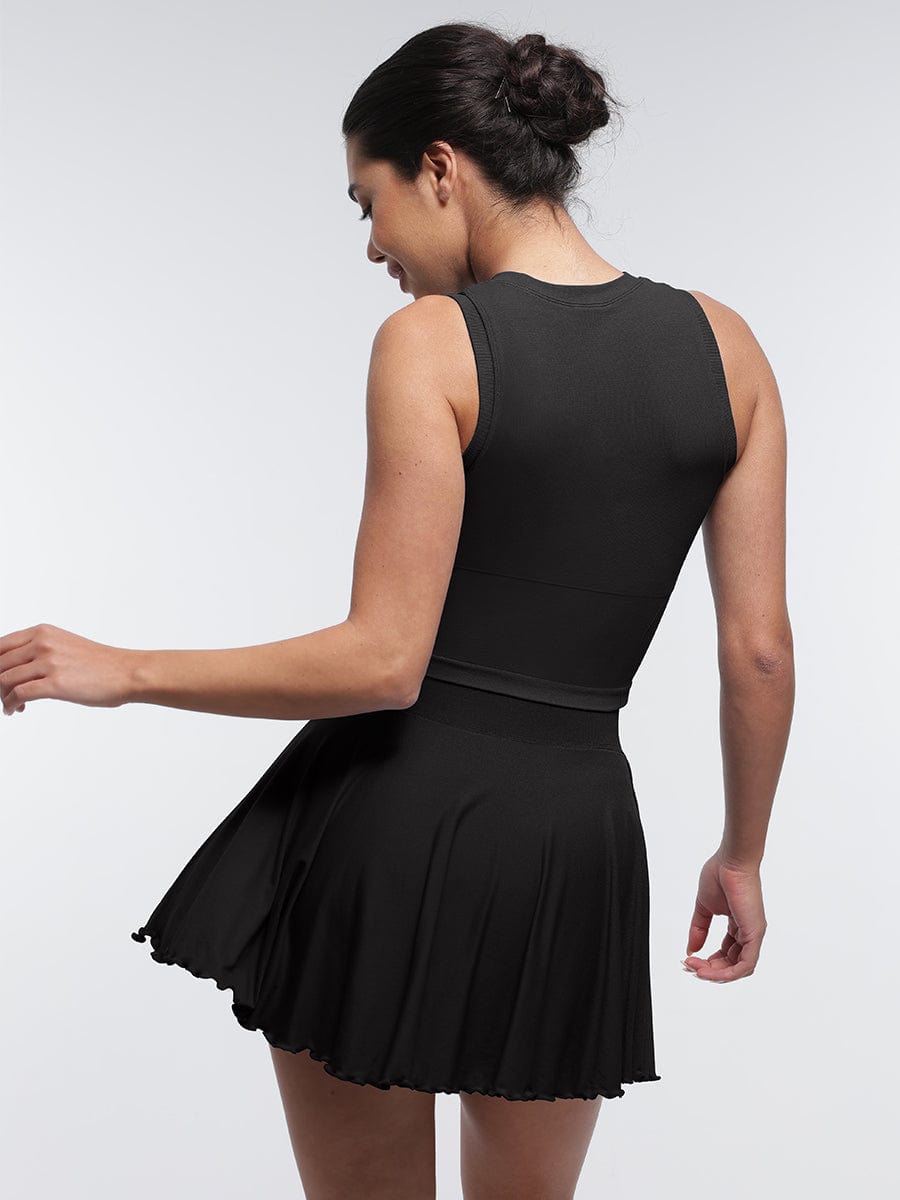 Falda acampanada de cintura media con volantes, pantalones cortos incorporados y bolsillos, venta