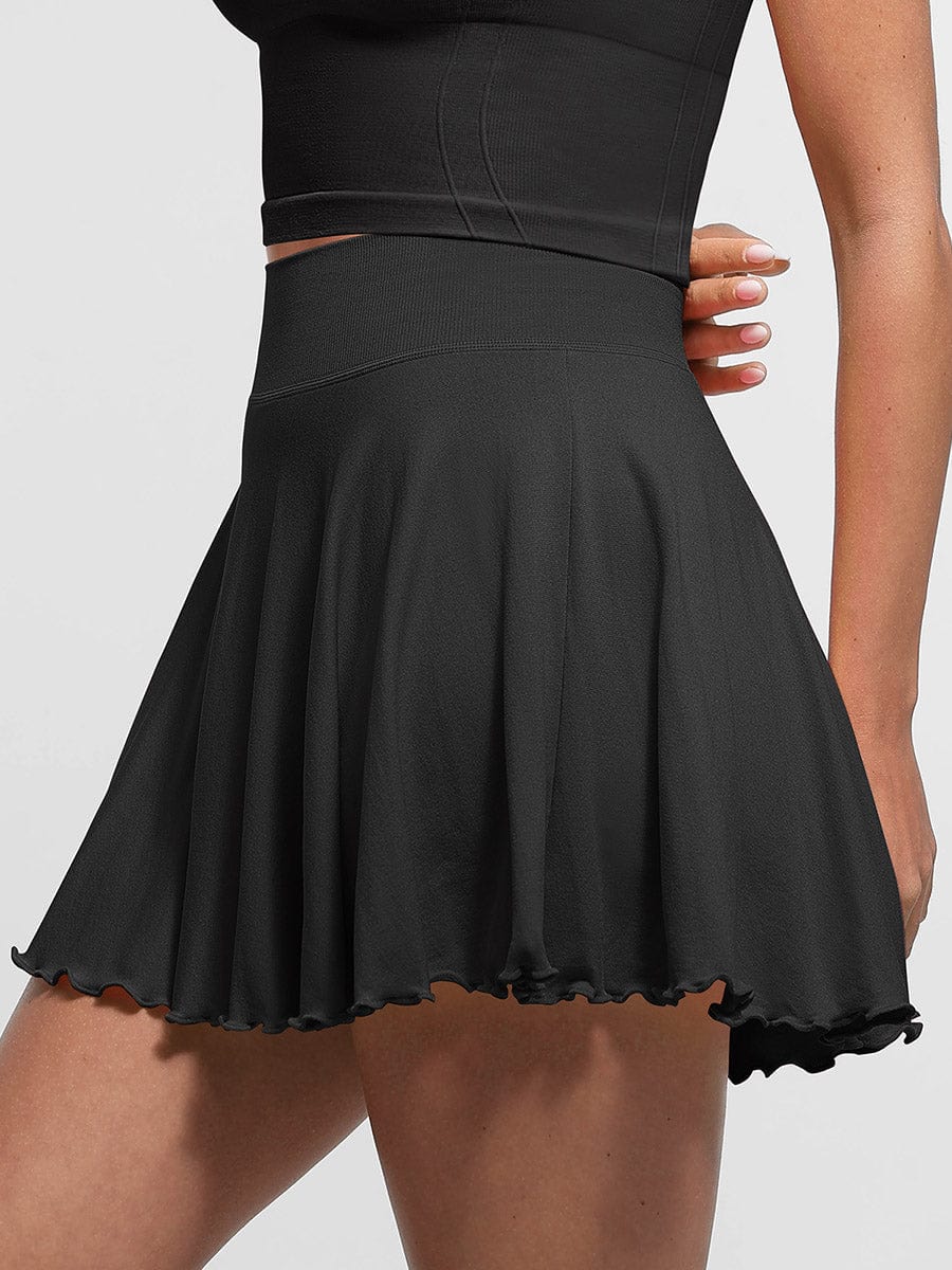 Falda acampanada de cintura media con volantes, pantalones cortos incorporados y bolsillos, venta
