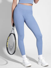 Leggings de yoga moldeadores de glúteos color melocotón con cintura doble sin costuras