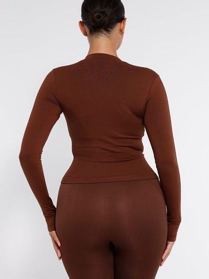 Camiseta de running con cremallera completa y agujeros para los pulgares, sin costuras