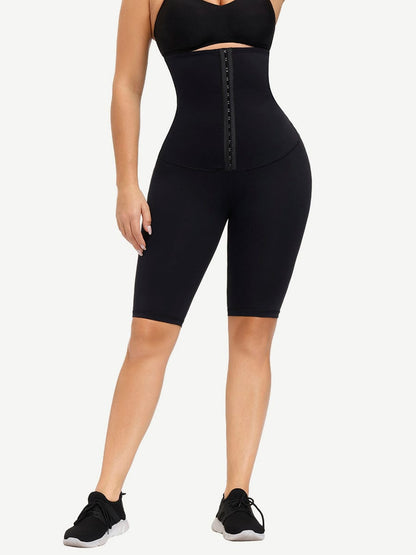 Faja azul oscuro antideslizante de longitud media para realzar glúteos y abdomen liso.