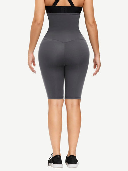 Faja azul oscuro antideslizante de longitud media para realzar glúteos y abdomen liso.