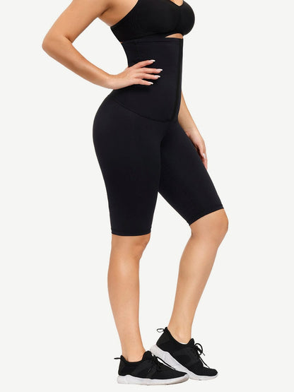 Faja azul oscuro antideslizante de longitud media para realzar glúteos y abdomen liso.